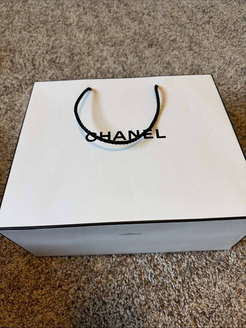 CHANEL White Shopping Bag with Black Rope Handles and Logo